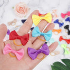 Detail view of elastic band on dog hair bow