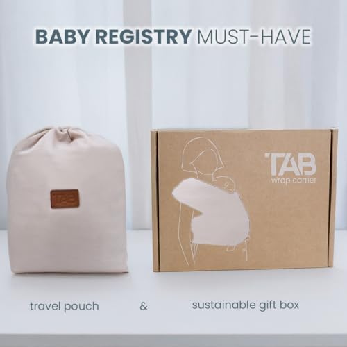 TAB PERFORMANCE breathable baby wrap being worn comfortably by a father
