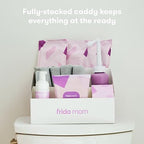 Frida Mom Perineal Healing Foam and storage caddy for bathroom organization.