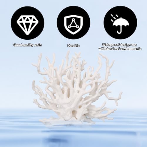 White resin coral decoration placed inside a clear glass aquarium