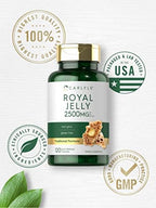 Carlyle royal jelly supplement bottle beside natural honey element aesthetic