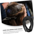 Waterproof silicone ear guards for shower and salon use.