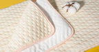 Close up of soft cotton surface texture of Ntoaujao bed pad