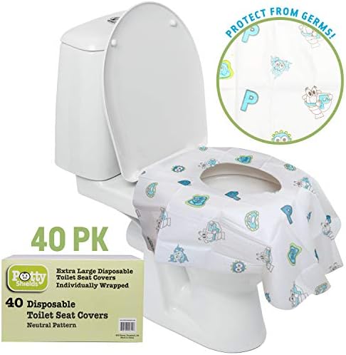 Individually wrapped travel packets of portable potty training liners resting inside a diaper bag.