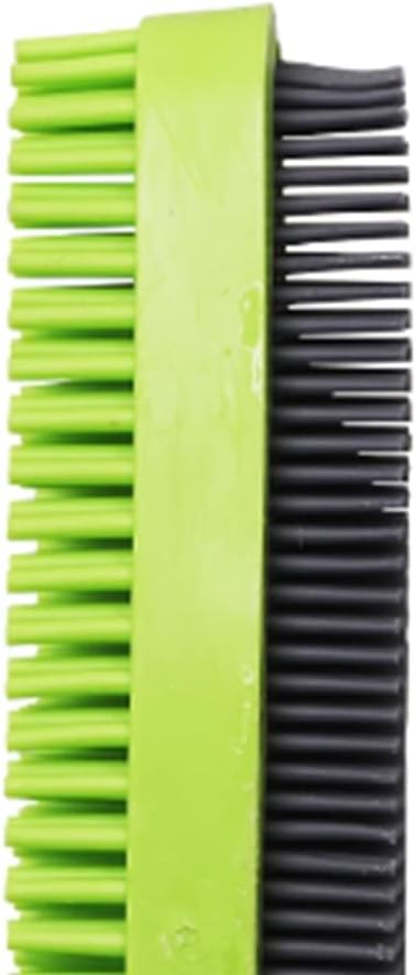 Washing rubber pet hair brush with water