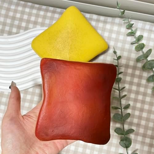 Premium slow-rising toy with a distinct buttered design on a desk setup