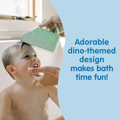 Parent using Dr. Brown's Dino-Pour cup for baby bath