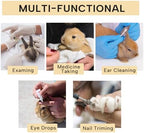 Maycreate pet calming swaddle wrap used by an owner for ear cleaning