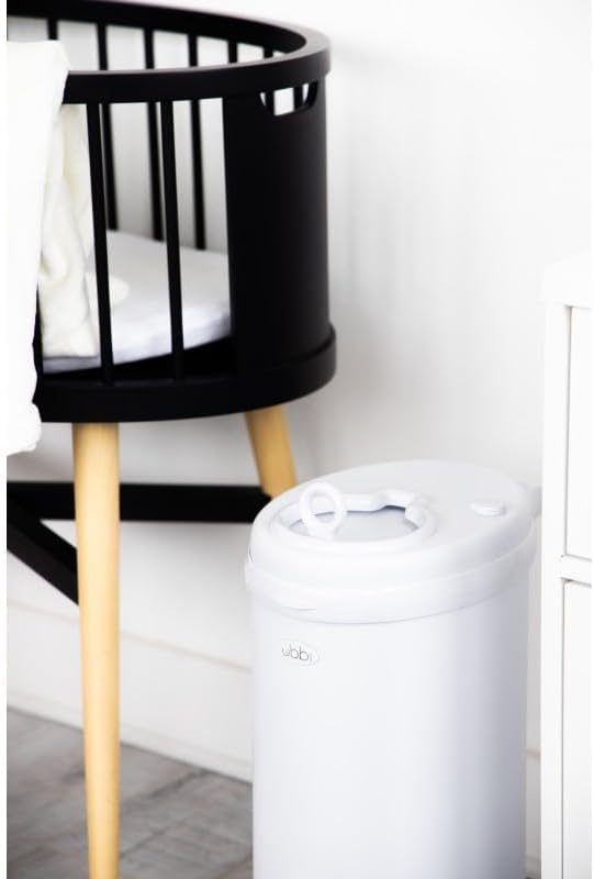 Ubbi odor locking nappy bin closed view displaying modern matte white finish