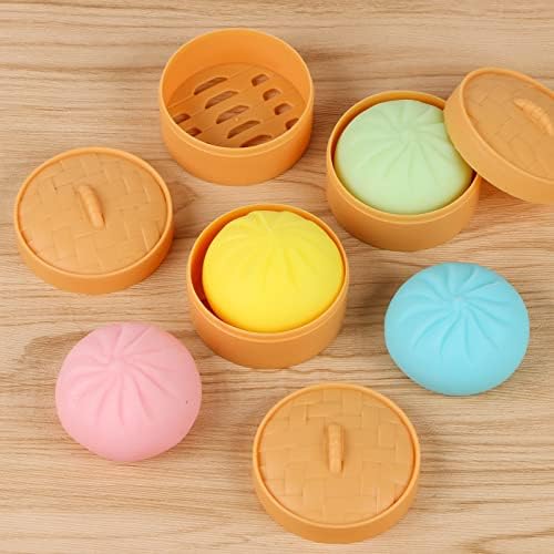 Four individual pieces of colorful baozi sensory toys in yellow blue green and pink shades