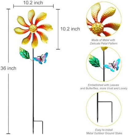 Kinetic wind sculpture installed in a lush green garden