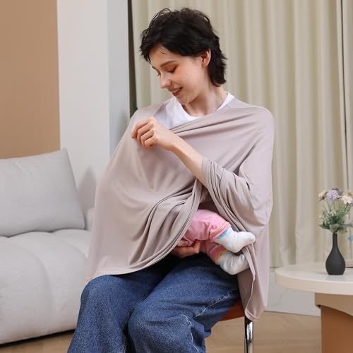 Mother using Seejoy nursing poncho in a public park