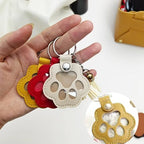 Leather dog fur memorial keychain in hand
