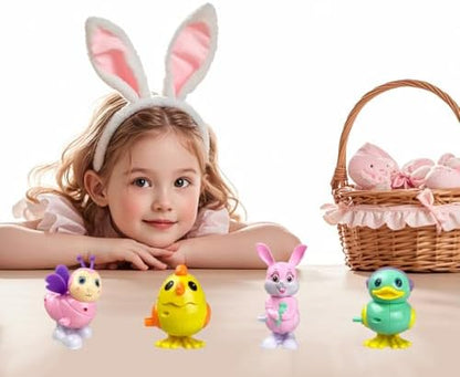 Anditoy plastic bunny and chick wind-up toys placed together on a flat playing surface.