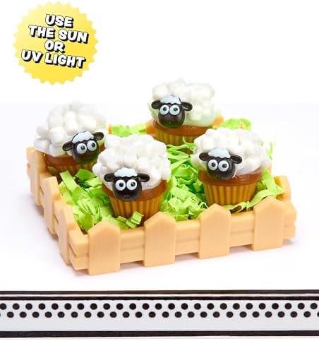 Completed miniature Bunny Cake and Deviled Eggs resin food replicas on display tables