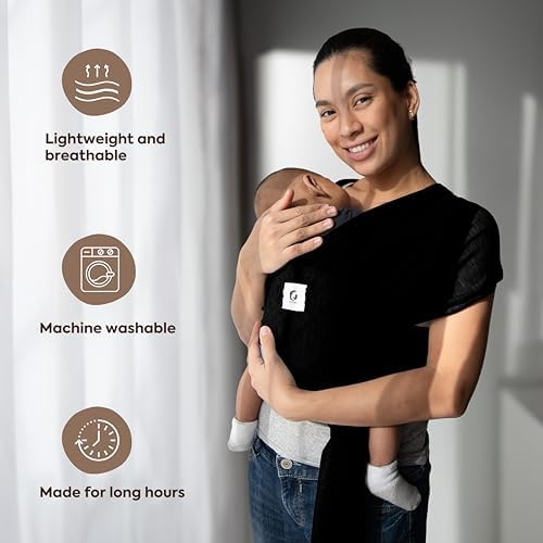 Father comfortably wearing the lightweight ELDOMA baby sling during outdoor activities