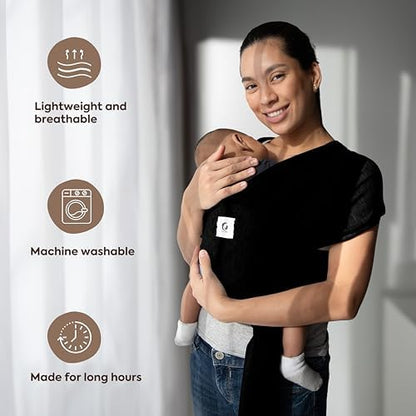 Father comfortably wearing the lightweight ELDOMA baby sling during outdoor activities