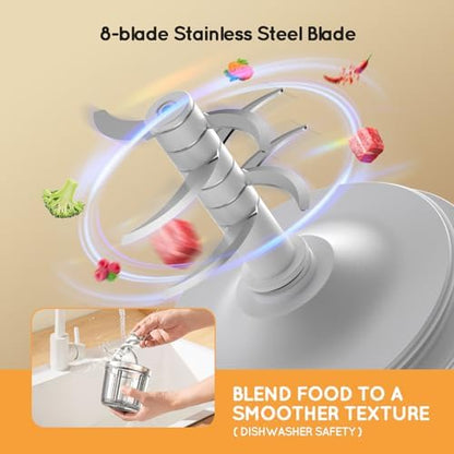 Baby food blender pureeing fresh organic vegetables into a smooth consistency