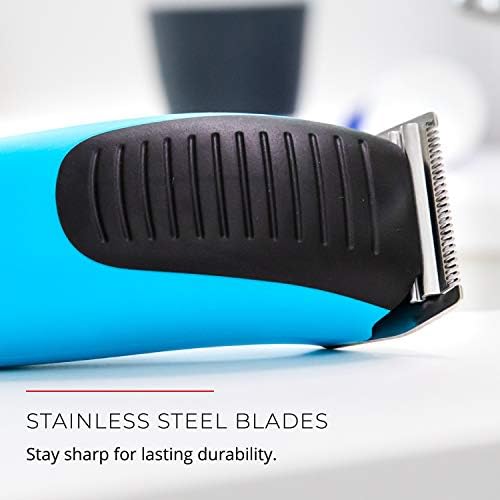 Remington low noise kids hair clipper packaged with barber scissors and clips