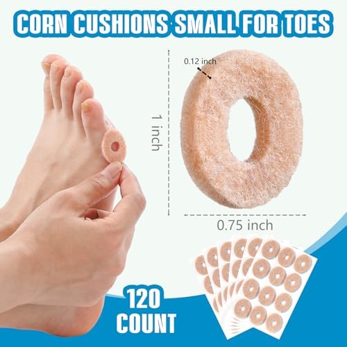 Close up of skin tone donut shaped adhesive foot protectors for blisters and friction