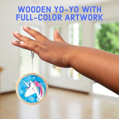 Unicorn illustrated wooden yo-yo held in a child's hand