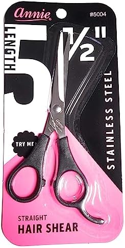 Close-up view of Annie 5.5 inch barber shears showing blade edge and finger rest