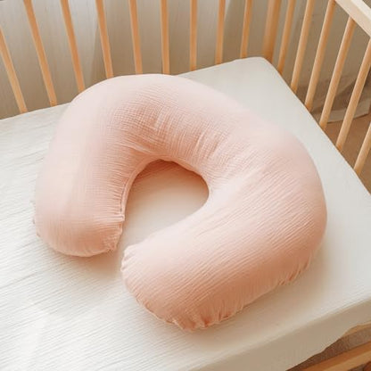 Pink floral nursing pillow cover used with a baby on a feeding pillow