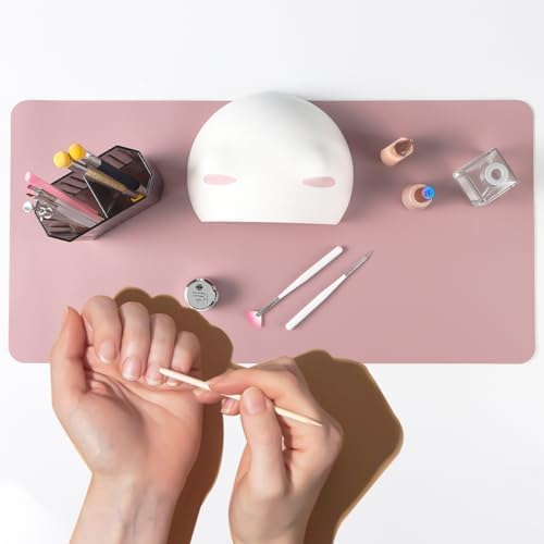 Close up view of anti-slip surface on pink nail art desk mat