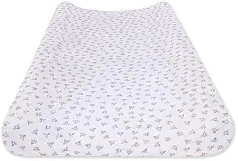 Close-up view of the grey bee print on the organic cotton changing pad cover.