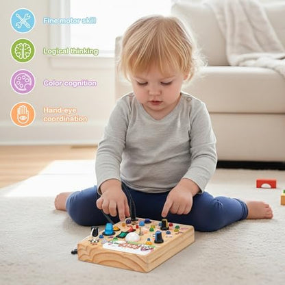 Side view of the farm theme sensory toy emphasizing the secure battery compartment.