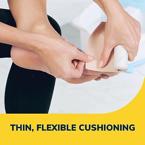 Self adhesive moleskin padding being cut to size for targeted callus relief