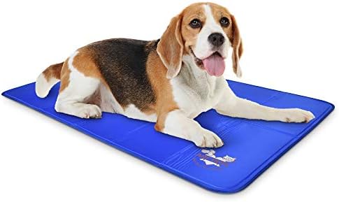 Pressure activated solid gel pet cooling pad placed inside a dog crate