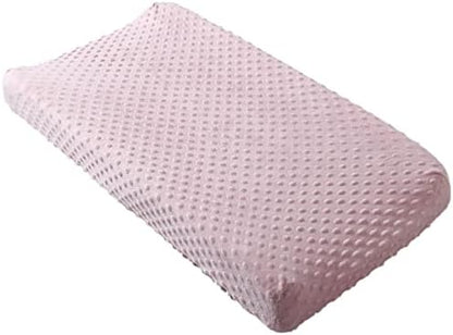 Close up shot of the skin friendly minky dots texture on the breathable baby table sheet.