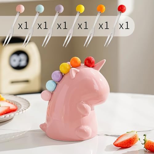 Six stainless steel mini food picks with colorful ball tops displayed outside the stand