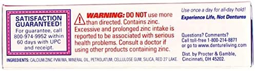 Denture adhesive cream sealing gum line to prevent food getting under dentures