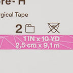Water resistant Medipore H medical tape being applied to secure a wound dressing