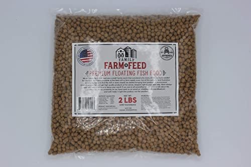 Close Up View Of Floating Fish Food Pellets