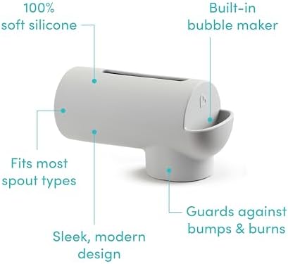 Water flowing cleanly through the Munchkin universal infant safety faucet cover.