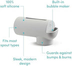 Water flowing cleanly through the Munchkin universal infant safety faucet cover.