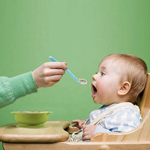Close up of the shallow bowl design on the gum friendly silicone infant weaning spoon.