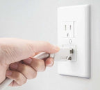 Close up of Safety Innovations white outlet guard in a closed position.