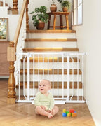 Pressure mounted adjustable metal dog gate protecting indoor staircase entry