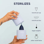 Blue cylinder shaped period cup sterilizer with one touch button.