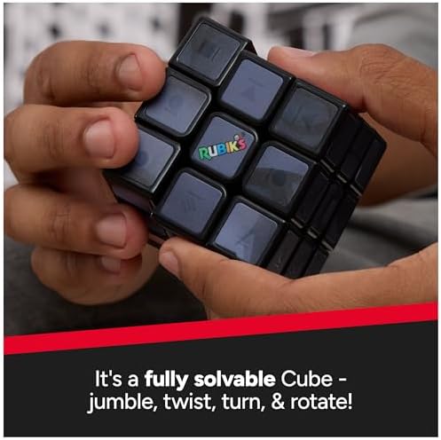 Rubik's three by three character cube being solved by hand for logical thinking development.