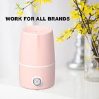 Pink period cup steamer with lid open showing internal sterilizing platform