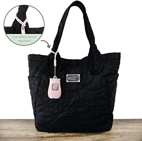 Moodie Teddy Bear Diaper Bag Dispenser displaying serrated edge and bag dispensing