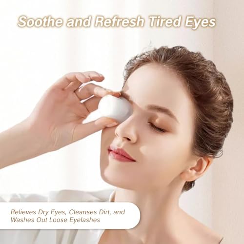 Ergonomic NIIIYTYB eye bath cup being held to demonstrate the flexible food-grade material.