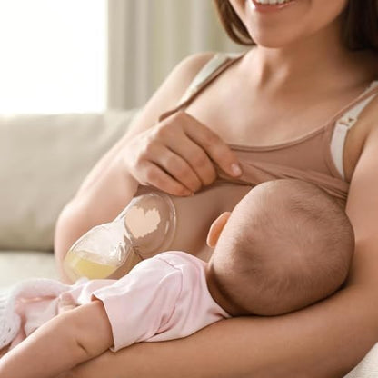 Clear manual silicone breast pump with clear ladybug milk catcher shell
