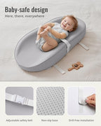 Light gray vegan leather baby changing pad placed on a nursery dresser top.