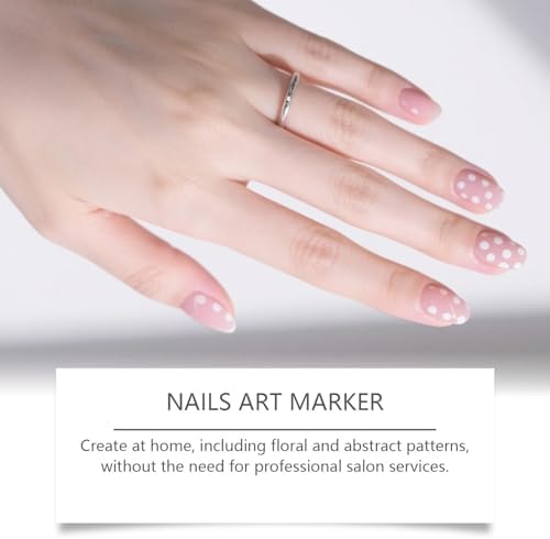 Artist using Skywork nail art pens for intricate dotting design